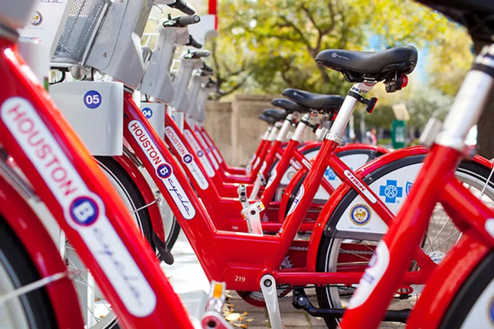 Close-up of red Houston BCycle bike share bikes parked at a station